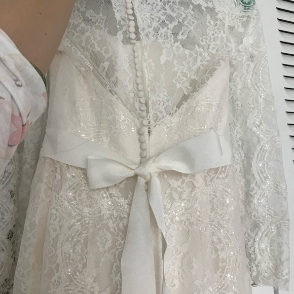 Lace long sleeve wedding dress. Never altered. - Picture 4 of 8